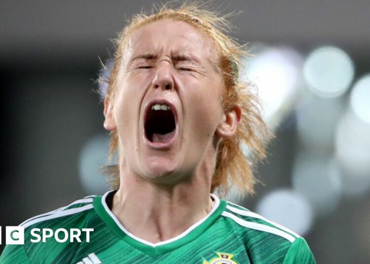 Rachel Furness dances with Northern Ireland team-mates