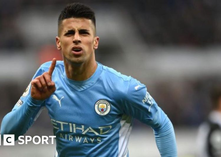 Joao Cancelo of Manchester City celebrates after scoring